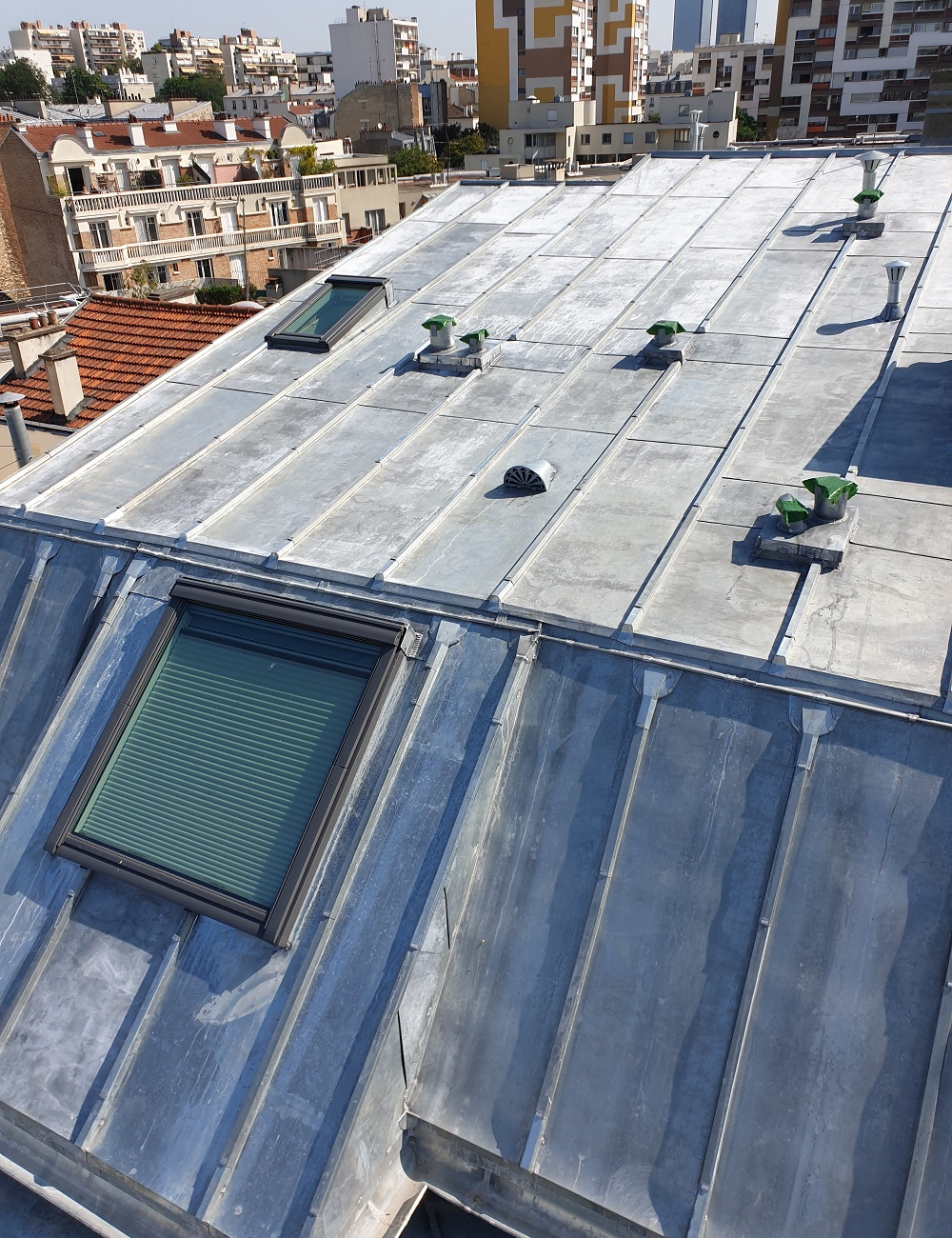 Rénovation de toiture sur immeuble haussmannien Paris 20