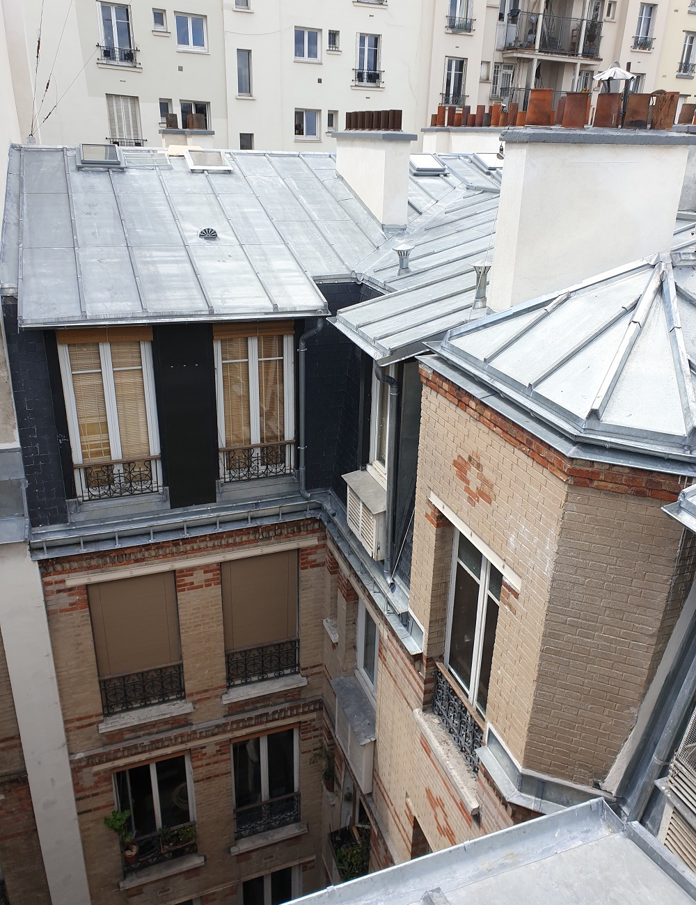 Rénovation de toiture sur immeuble haussmannien Paris 18